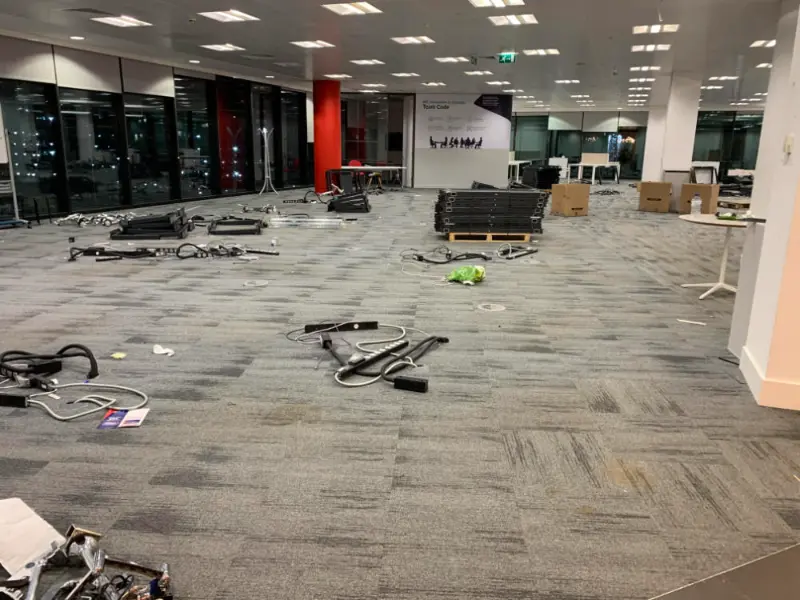 Office Floor with grouped items ready to be cleared