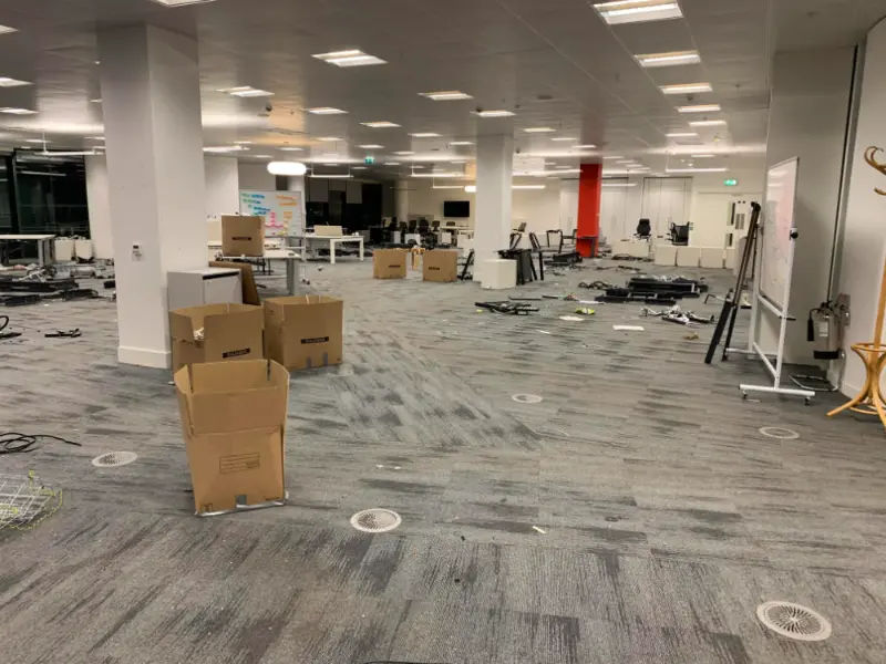Unused office floor full of rubbish waiting to be cleared