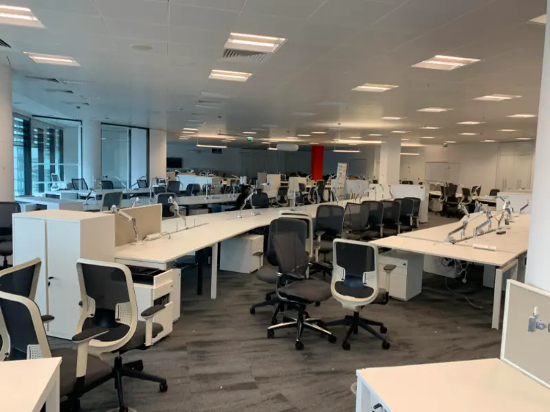 Office Furniture ready to be cleared following electrical uninstallations