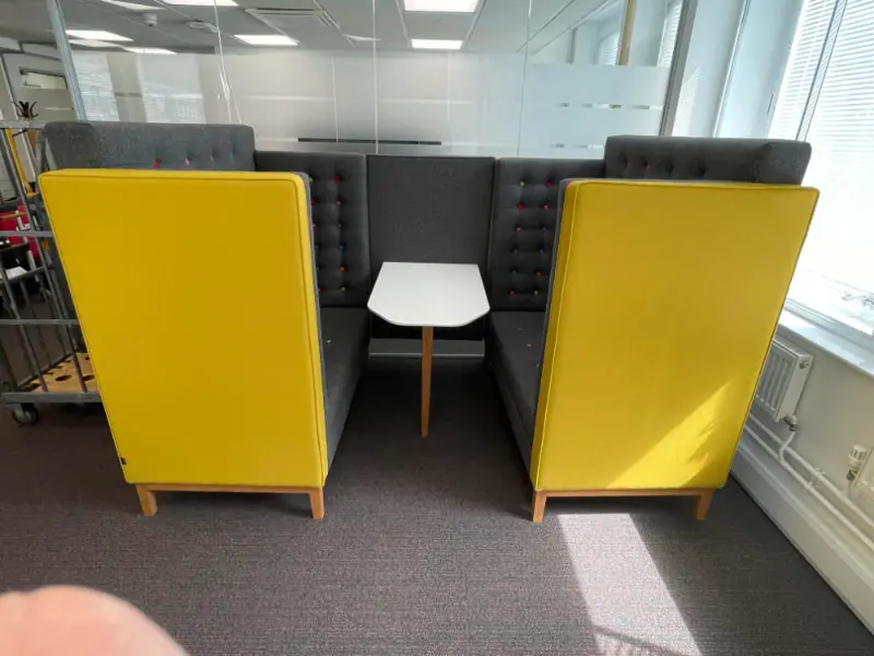 Office sofa booths ready to be cleared
