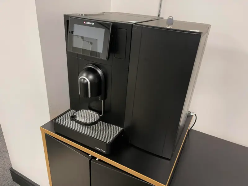 Office coffee machine ready to be cleared
